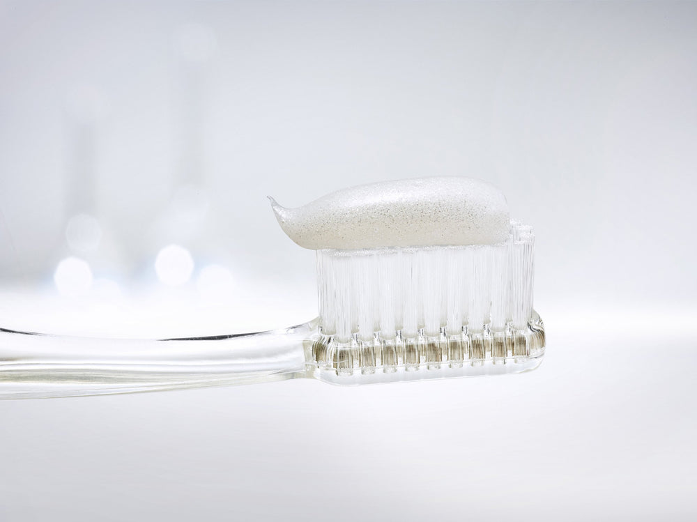 Regenerate Enamel Science Toothpaste on a toothbrush
